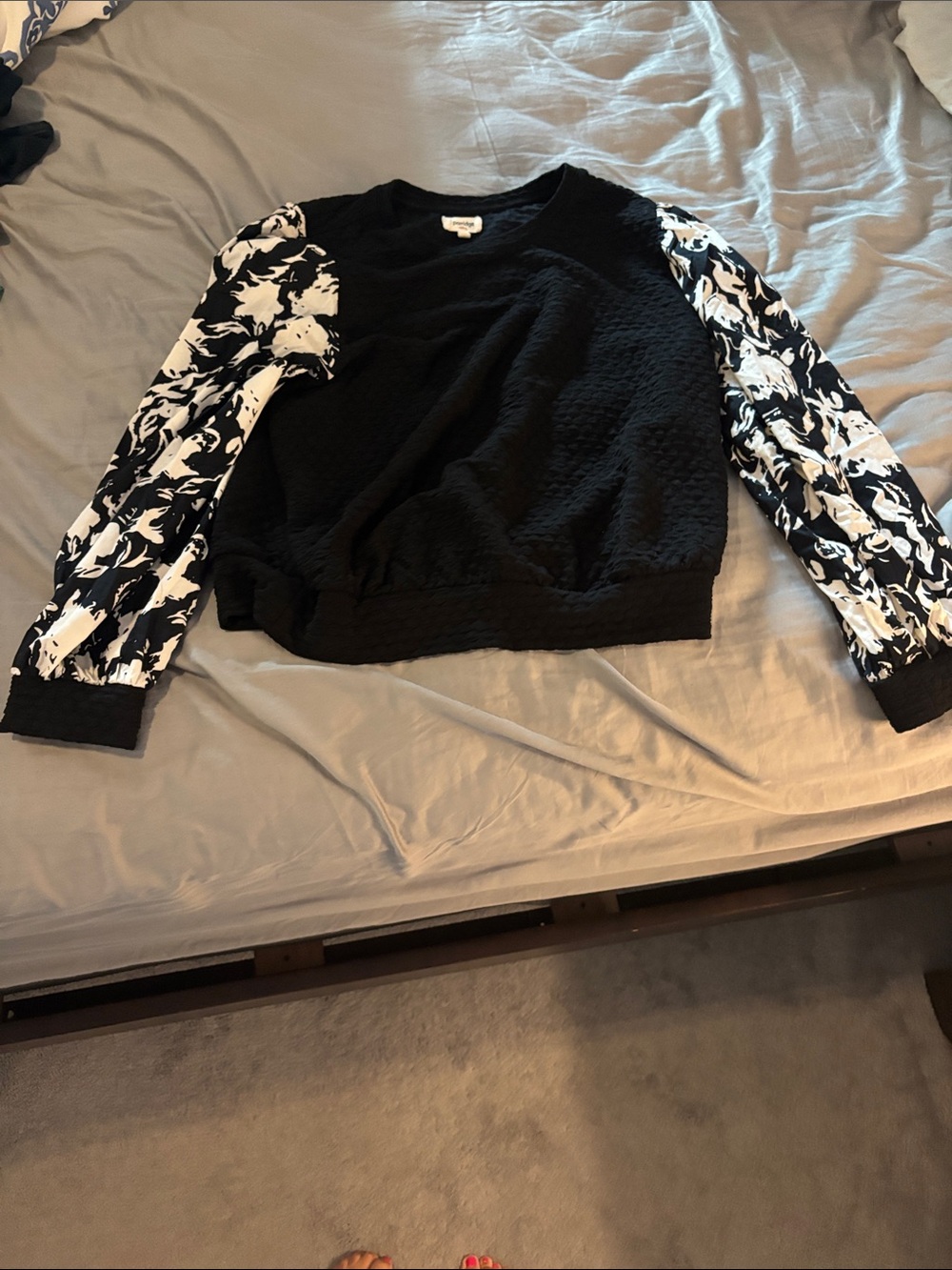 Black Pullover Sweatshirt with Black & White Floral Sleeve Accents